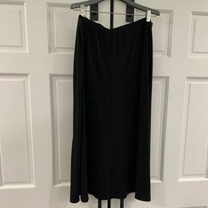 New, never worn, no tags, black dress skirt.